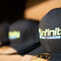 Cap with Infinity Energy Solutions logo